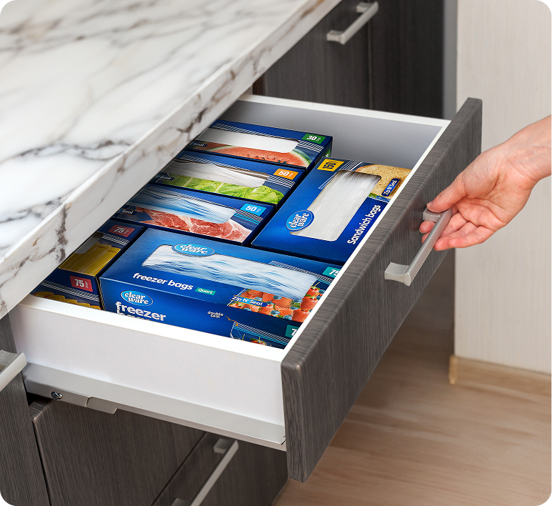 Children holding ClearWare bags